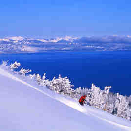 Skiing Heavenly with Lake Tahoe in the backdrop