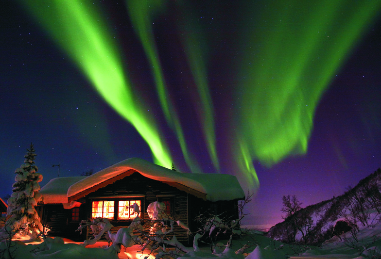 ￼Norway Aurora Borealis over cabin, Voss