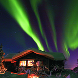 ￼Norway Aurora Borealis over cabin, Norway
