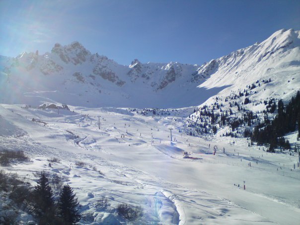 Going up on chairlift in Val Thorens