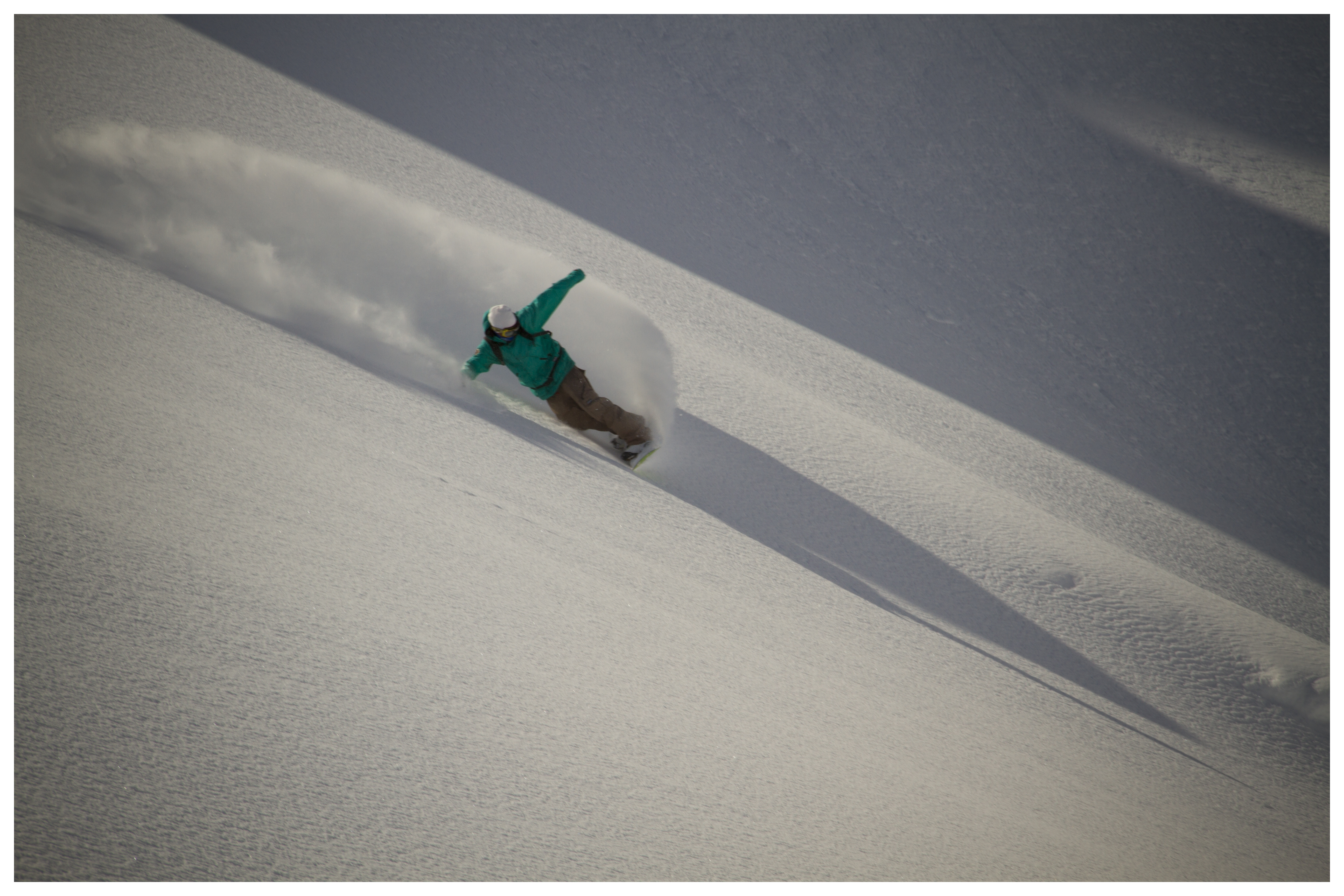 Vivid snowboarding , powder slash, Verbier