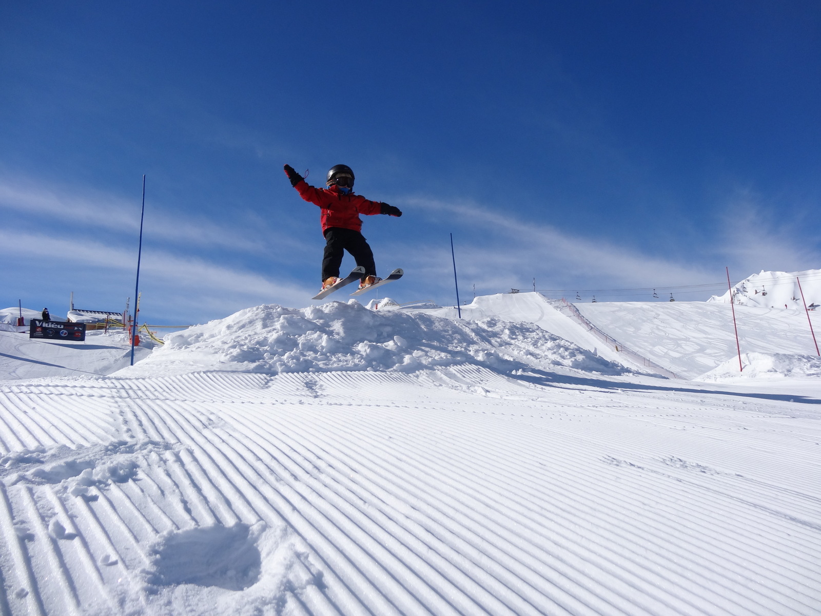 My four year old doing a blue jump in La Plagne, Champagny