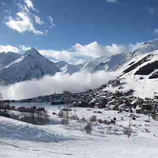 Les Deux Alpes above the clouds