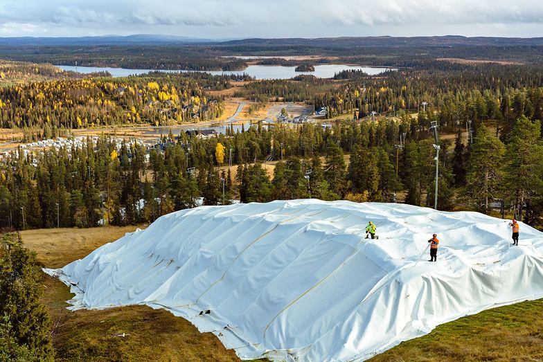 Last season's snow stored under cover at Ruka