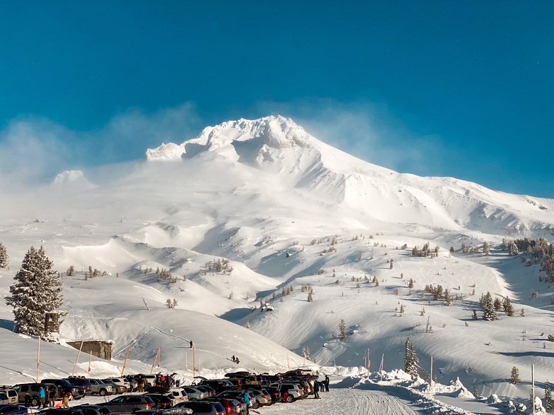 Mt Hood peaks out from the clouds briefly Monday morning, Timberline