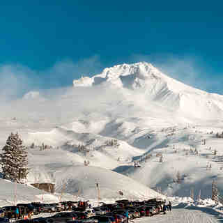 Mt Hood peaks out from the clouds briefly Monday morning, Timberline