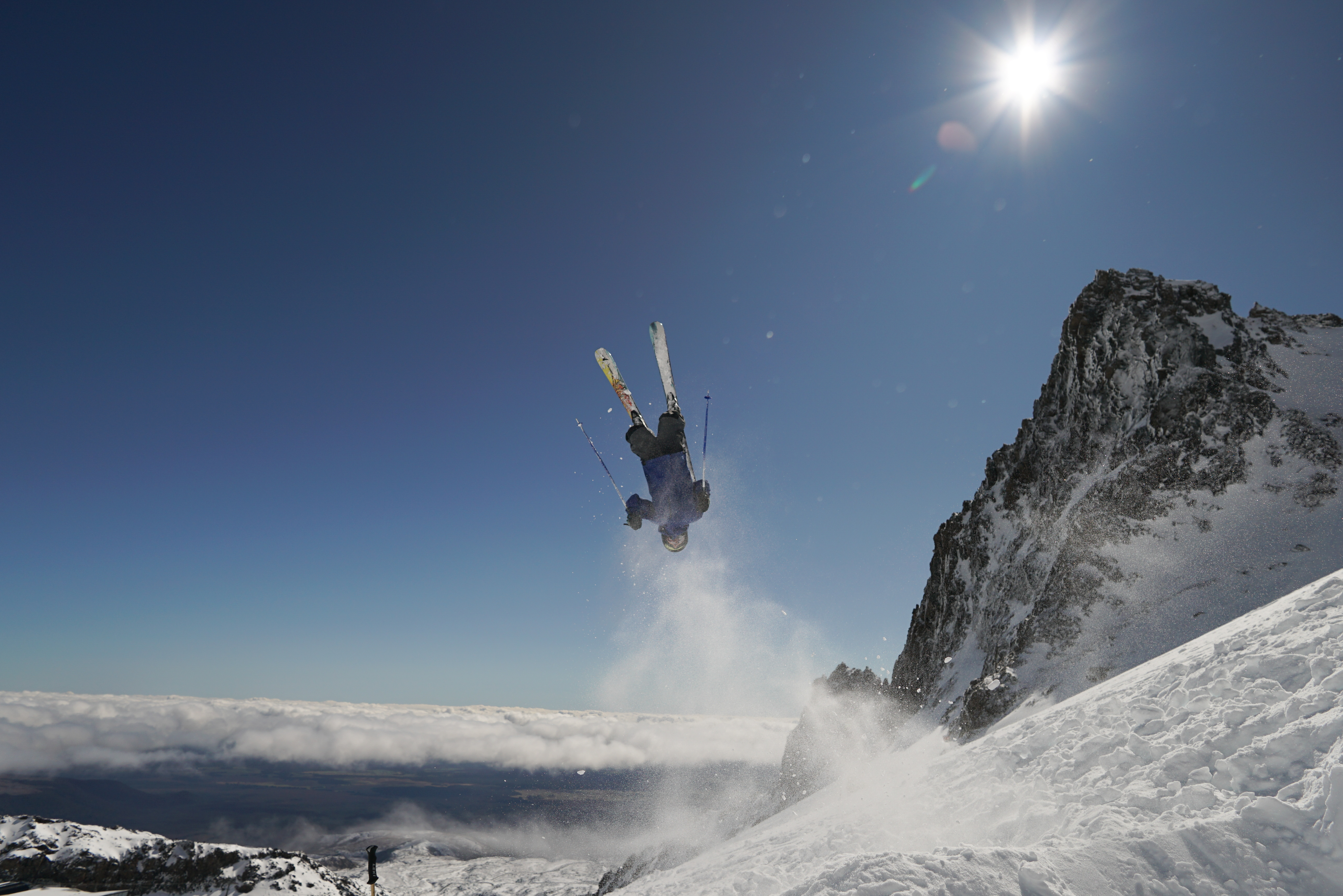 Koda flipping beneath the pinnacles (Nga Tohu Peaks) - Photo Tarn Hoyle, Whakapapa