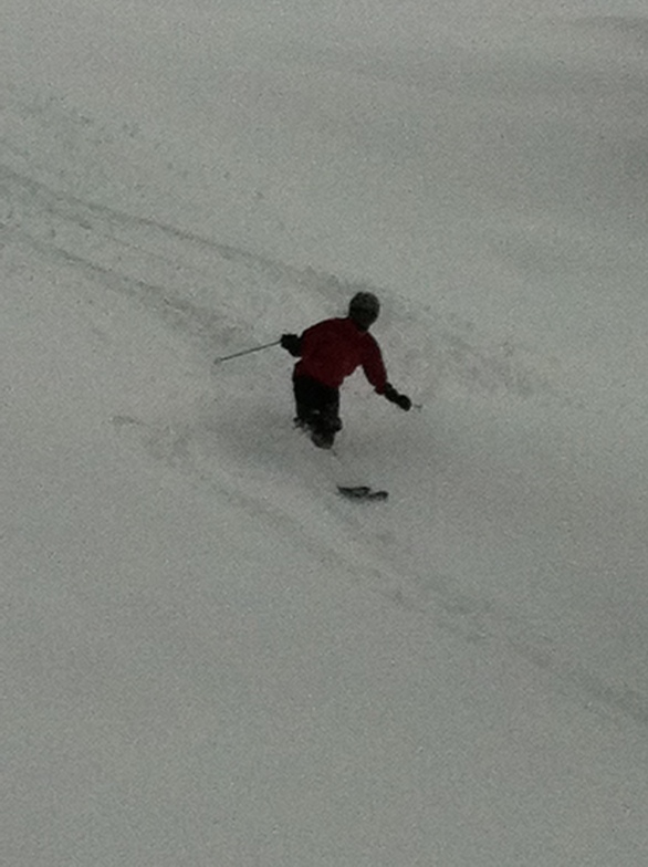 Gabby shanahan making perfect tracts in the gully above Obersaas, Davos