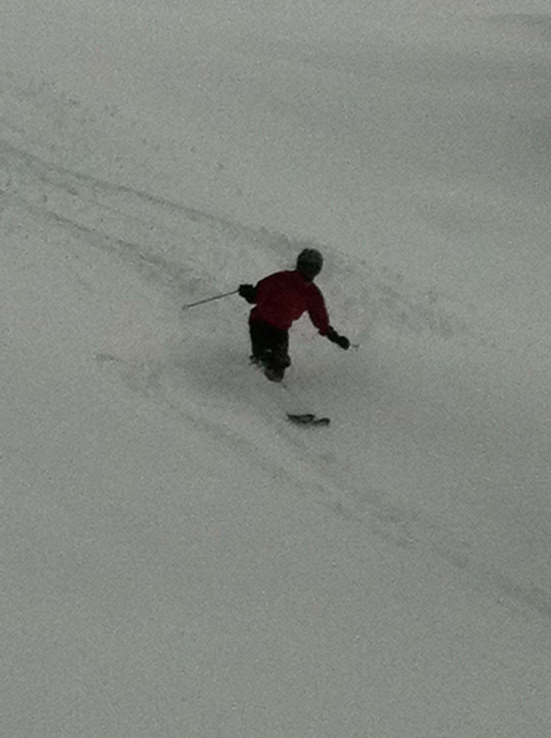 Gabby shanahan making perfect tracts in the gully above Obersaas, Davos