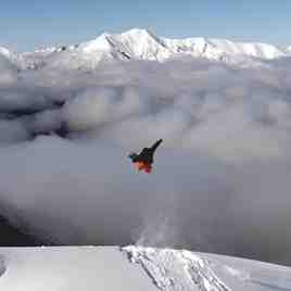 Flying high into A basin, Mount Cheeseman