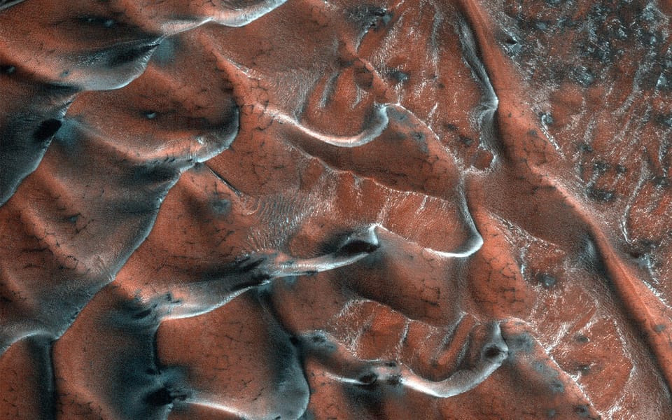 Ice on Mars a “Remnant of Ancient Dusty Snowfalls”