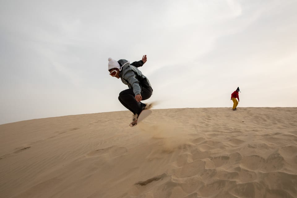 Snowboarders Can Make Up for a Missed Winter By Riding Sand Dunes in Qatar