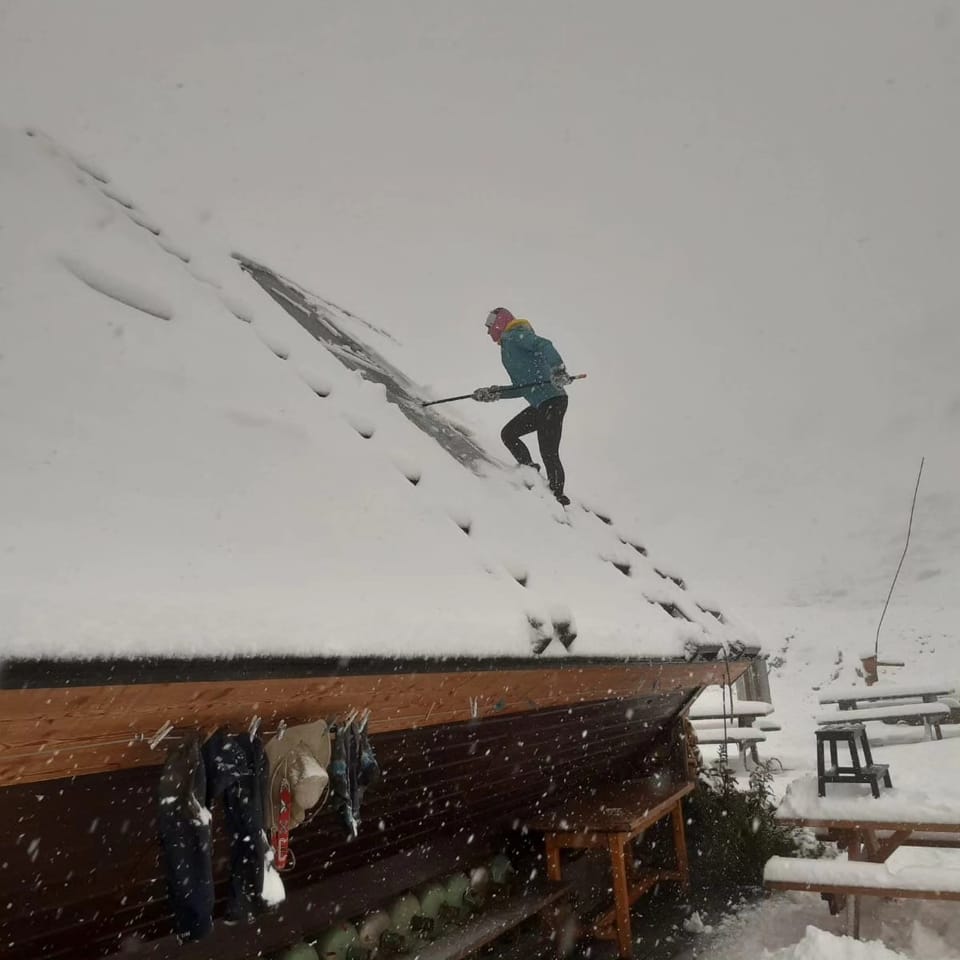 August Snowfall Across The Alps